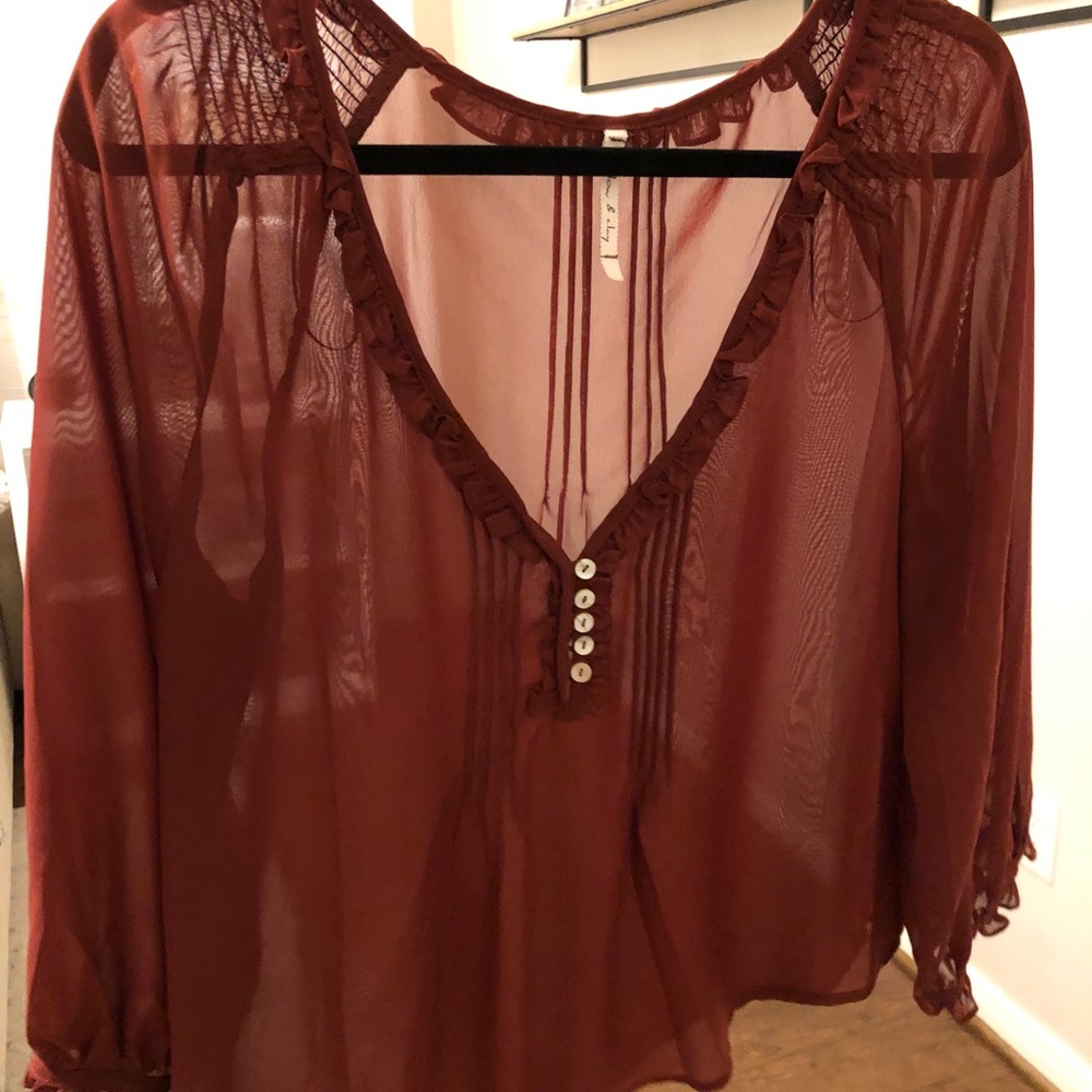 Rust colored sheer peasant top